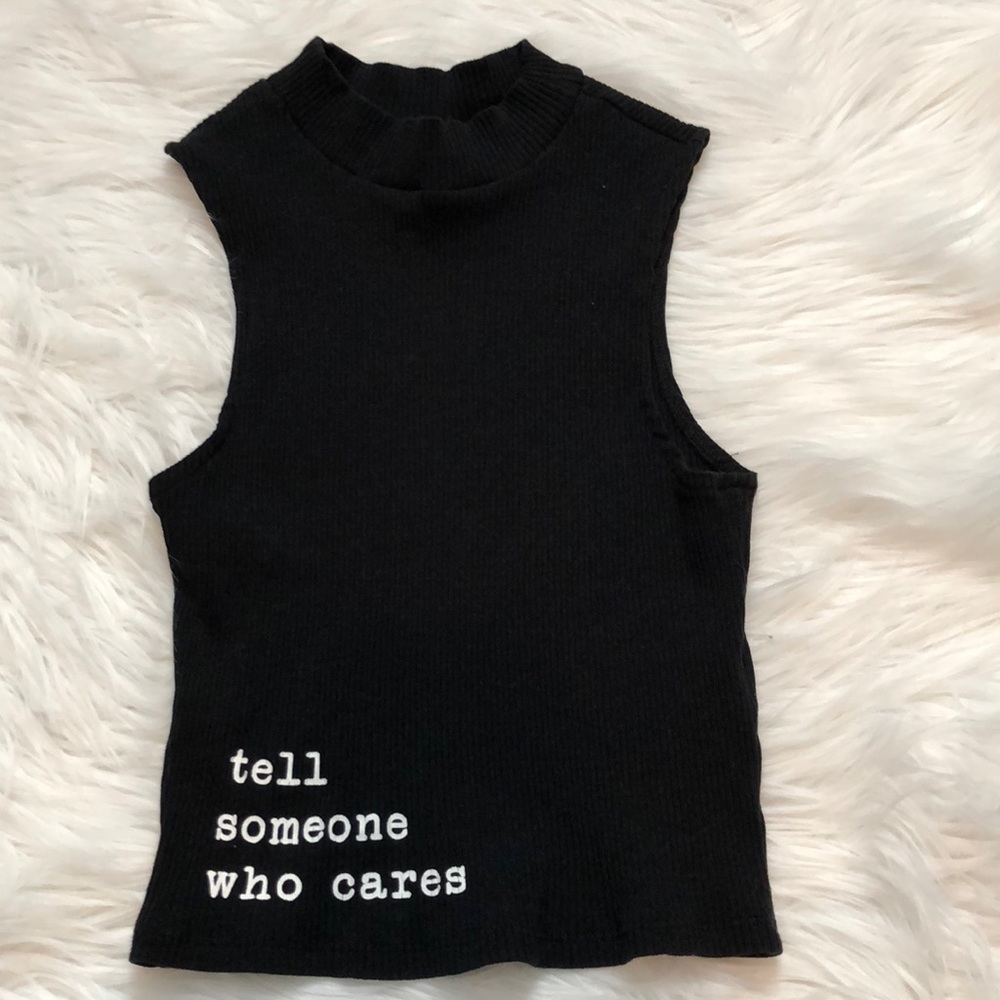 “Tell someone who cares” mid-crop top Size Small